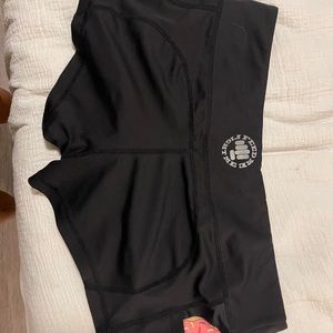 Black workout shorts with donut pocket